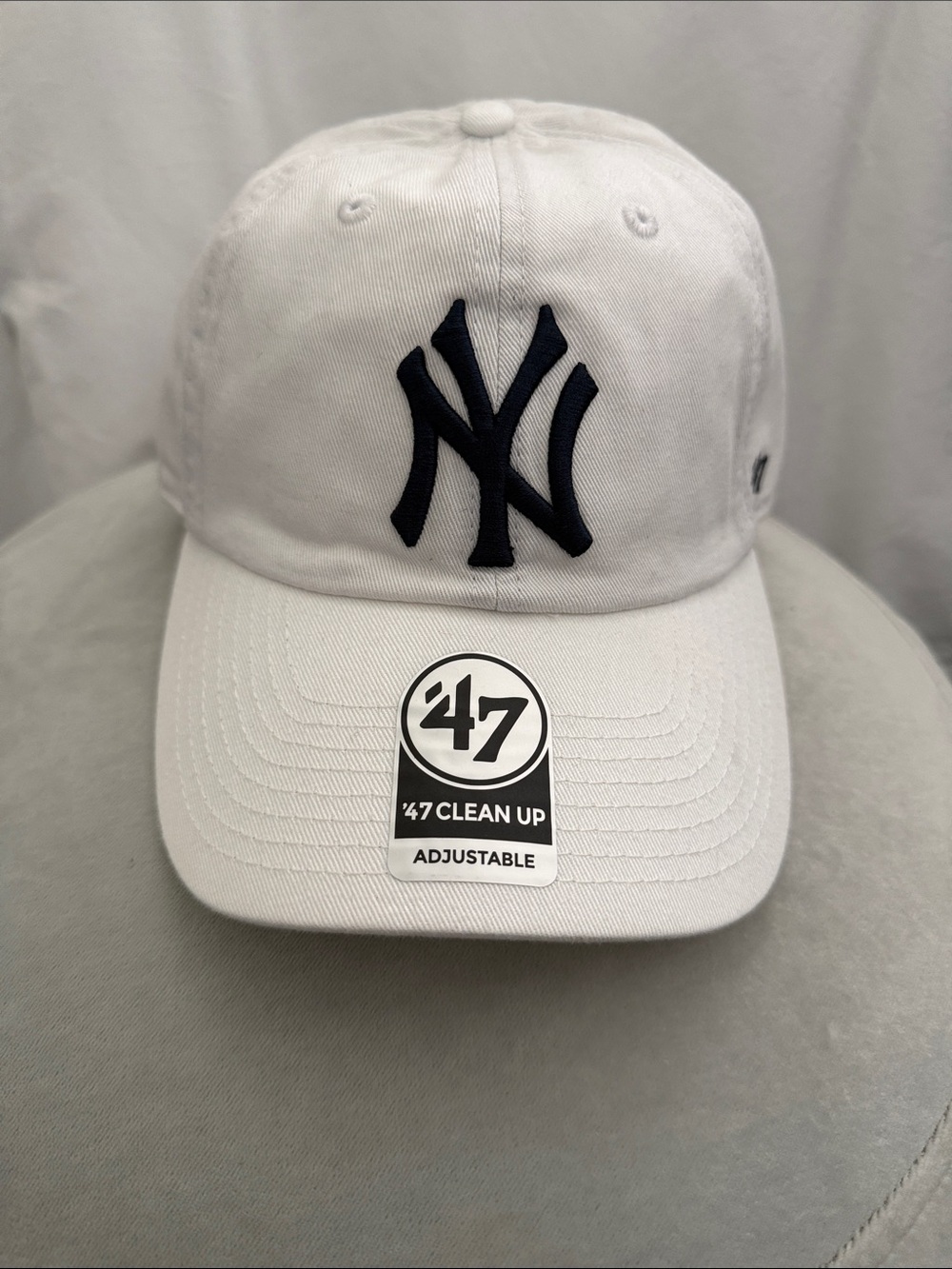 47 White Women’s New York Yankees Clean Up Adjustable Cap with Navy Logo